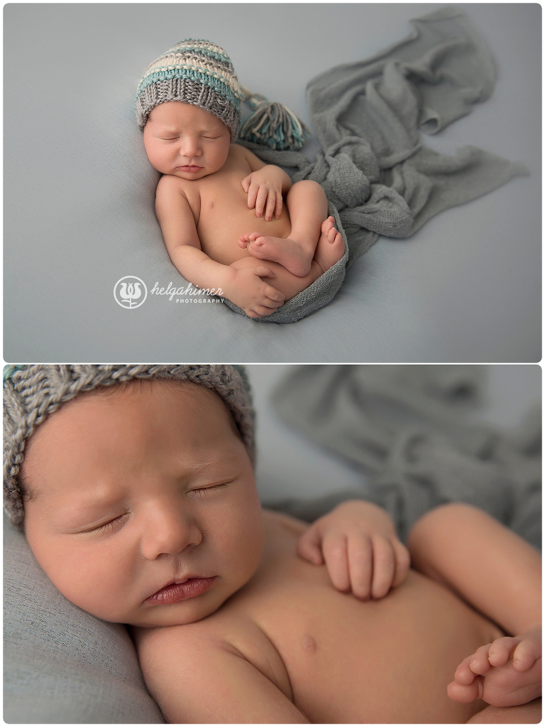 newborn baby photographed in studio on a beanbag laying on his back