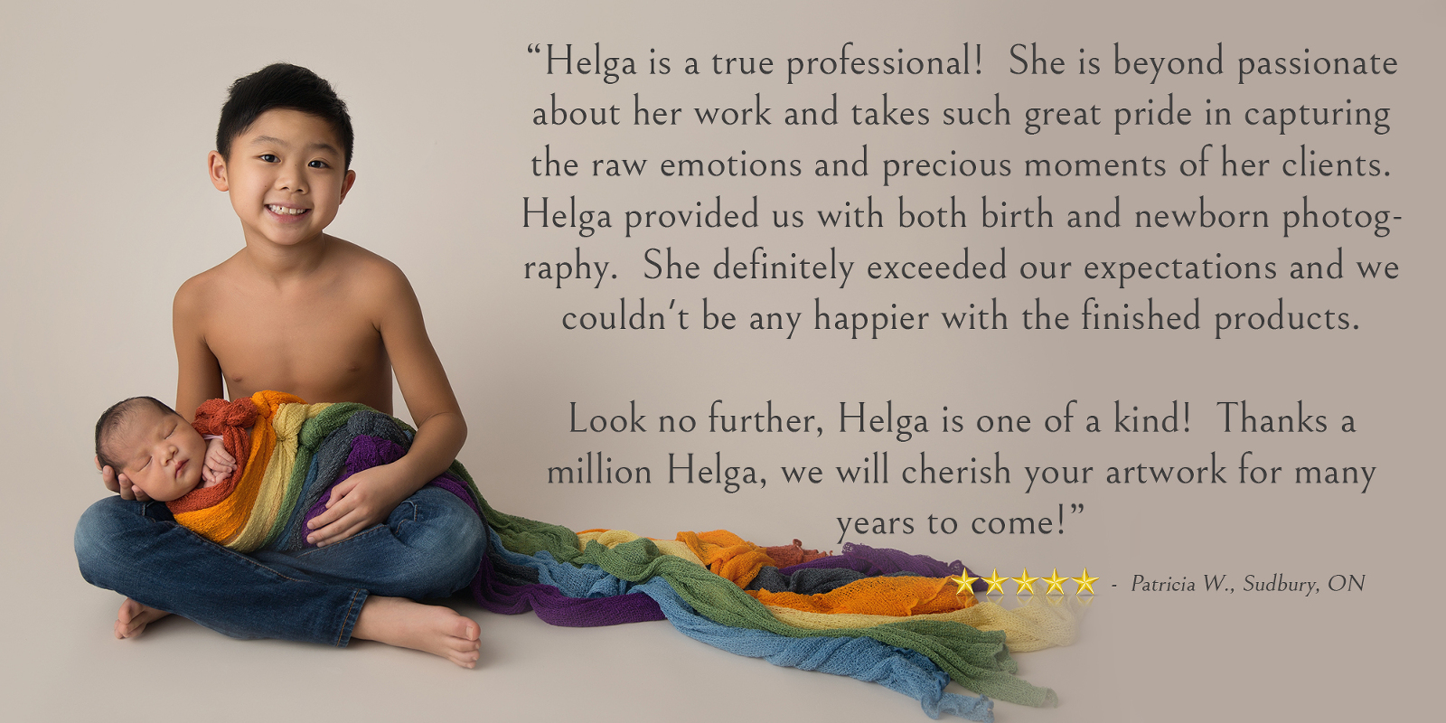 Client Testimonial - Studio newborn portrait session of a rainbow baby, with the older brother happily sitting facing forward with his sleeping newborn sibling on his lap, wrapped in a rainbow blanket. Image by Helga Himer Photography, Sudbury, Ontario.