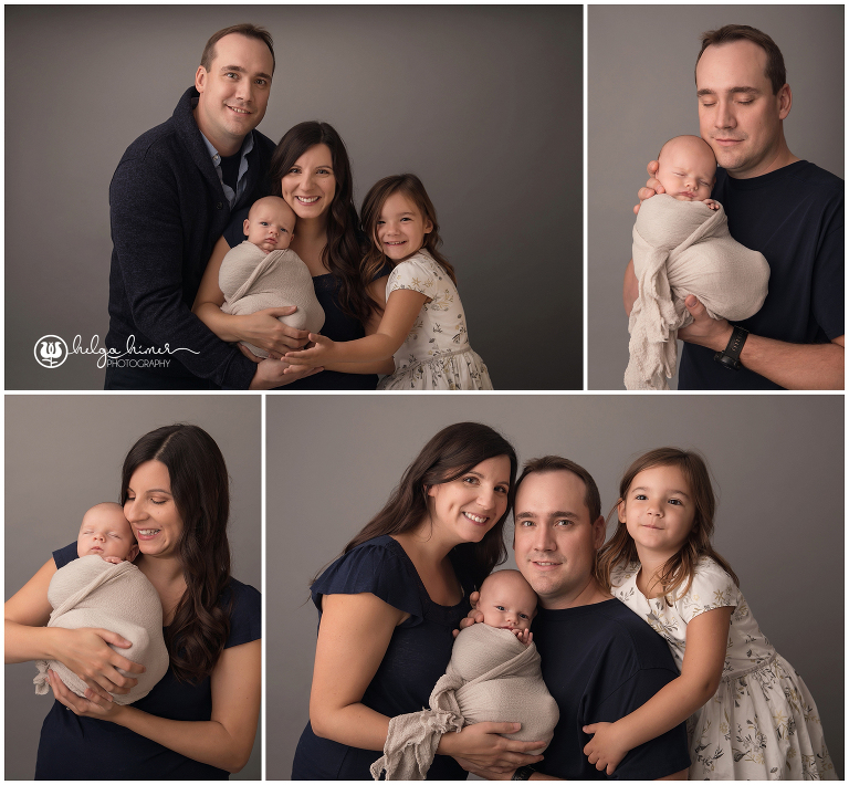 family photography session with a wrapped up infant and a toddler